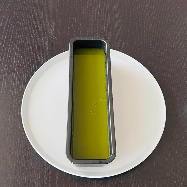 adding the matcha mizu yokan to the mold