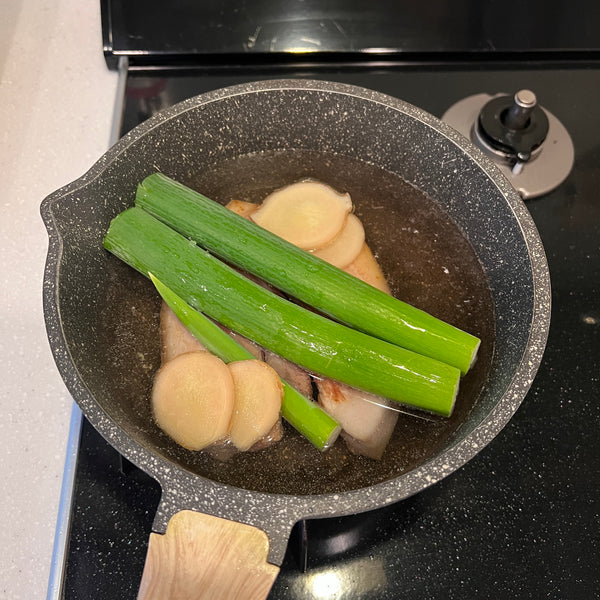 simmering the pork belly