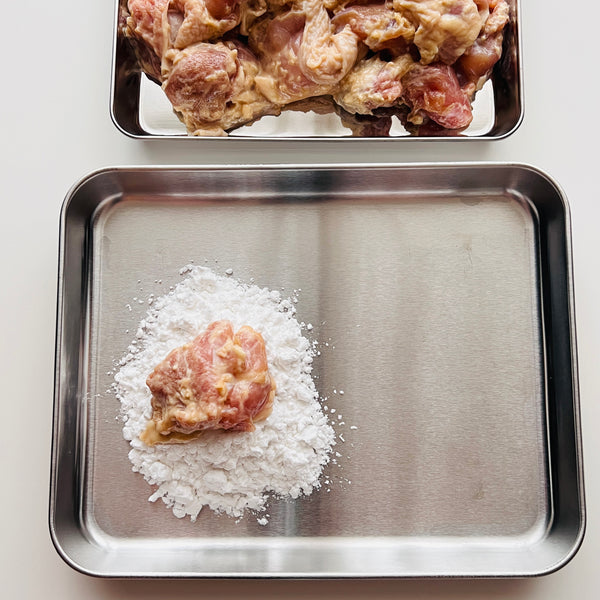 dusting the chicken in potato starch