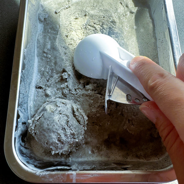 scooping the black sesame ice cream
