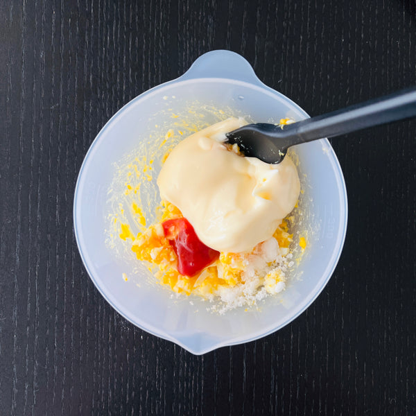 mixing tartar sauce ingredients in a bowl