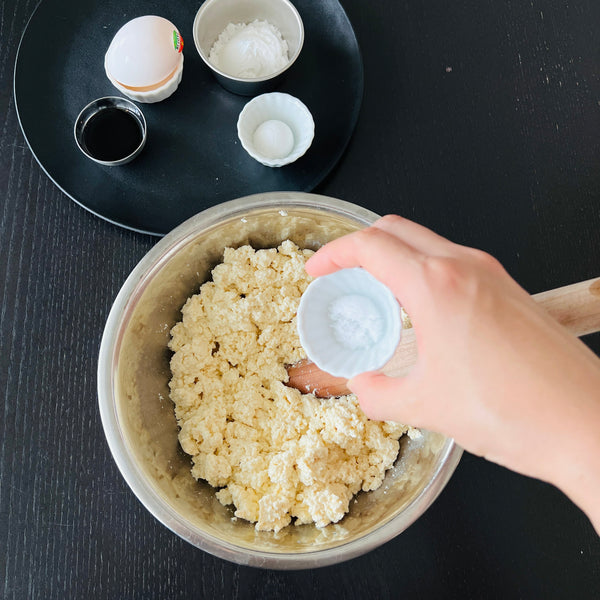 adding the seasonings and the egg to the tofu