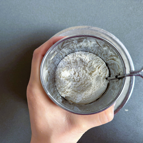 sifting the flour