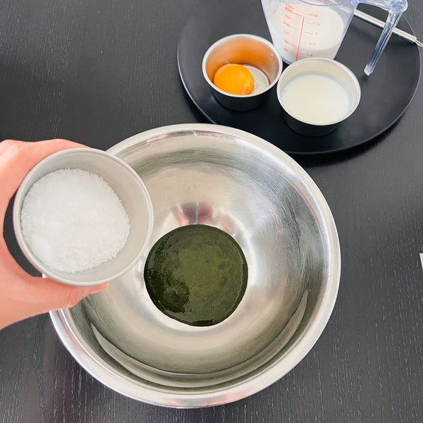 adding the rest of the ice cream ingredients into the matcha