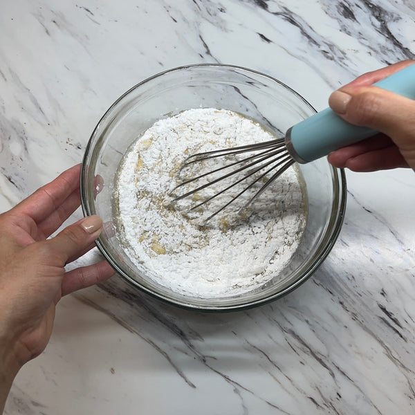 mixing everything together with a whisk