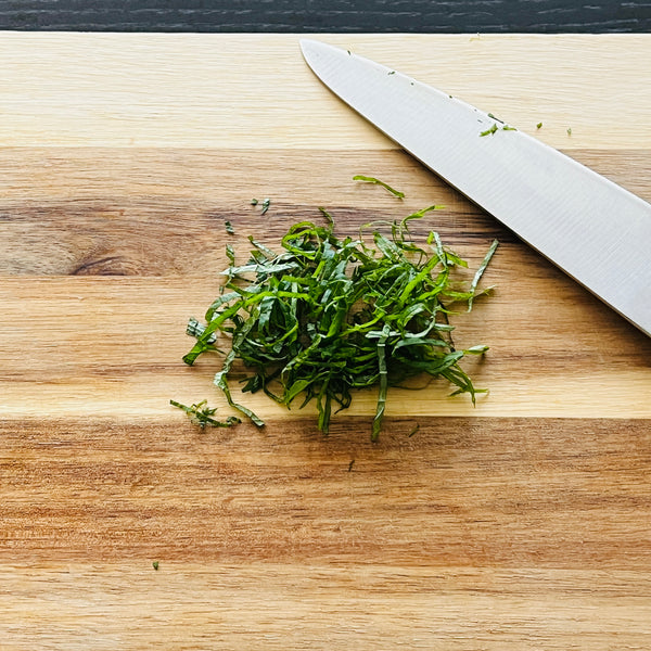 slicing the shiso into julienne strips