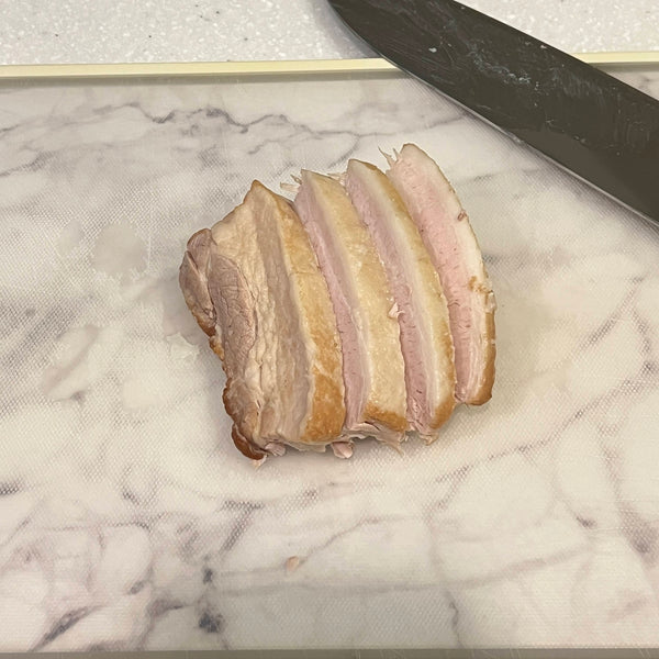 slicing the pork belly