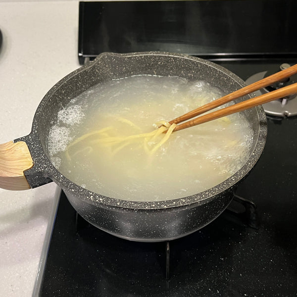 cooking the noodles until al dente