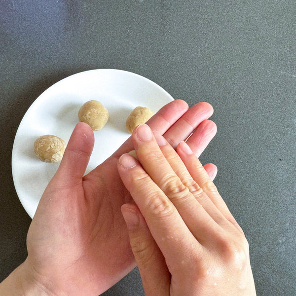 rolling the white bean paste into balls