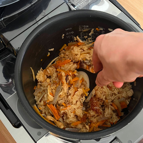 mixing the rice from the bottom