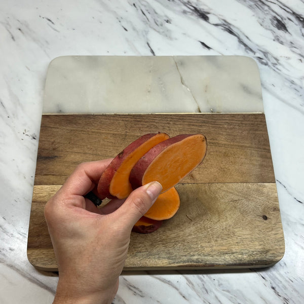 cutting the sweet potatoes