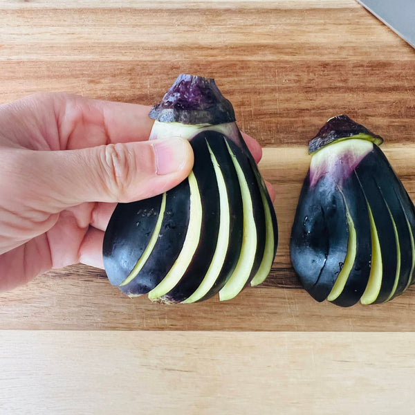 fanning out the eggplant to create a more even cooking surface