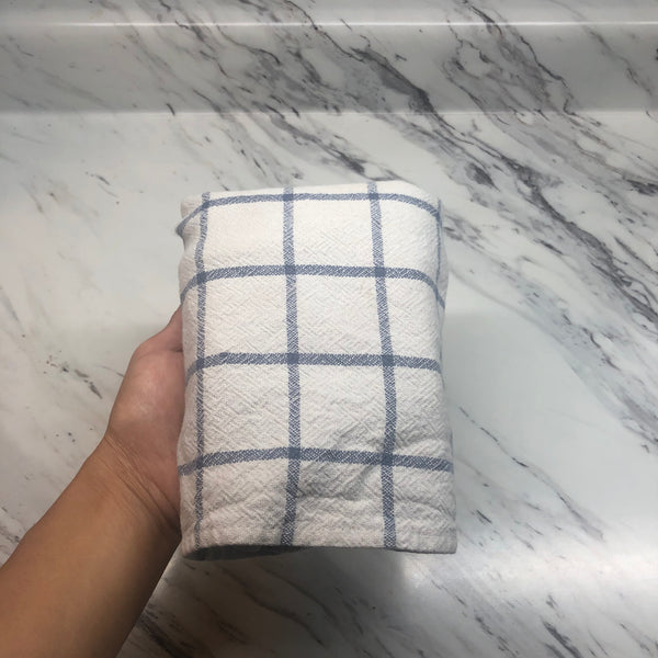 wrapping the tofu in a kitchen towel