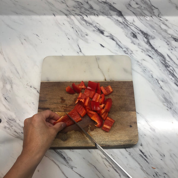 cutting the red bell pepper