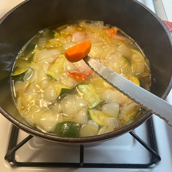 cooking the veggies until tender