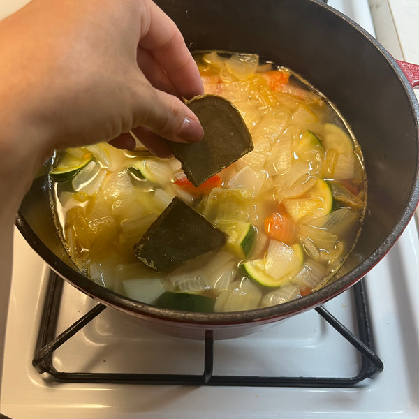 adding the curry roux cubes into the pot