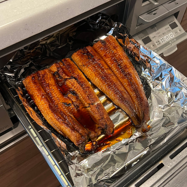 grilling the unagi until it begins blistering