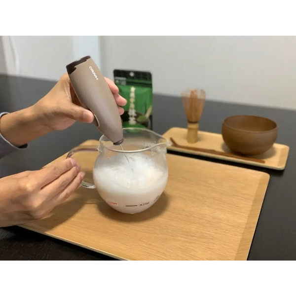 frothing the almond milk