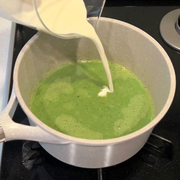 adding the rest of the milk back into the matcha mixture