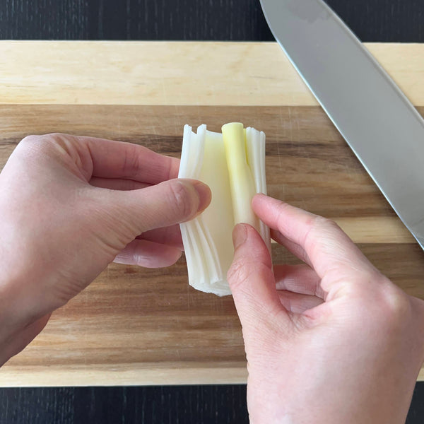 removing the inner core of the leek